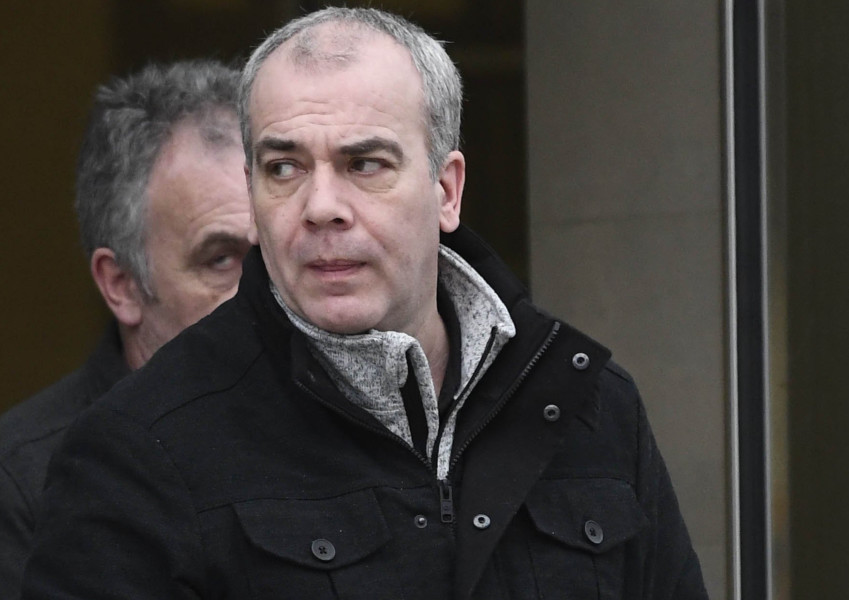 Colin Duffy leaves Belfast Crown Court after Thursdays proceedings