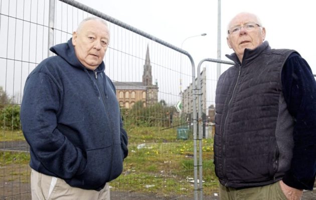 Gerard Brophy and Frank Dempsey at the vacant site on Clifton Street. Picture by Mal McCann